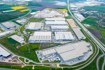 Aerial view of a logistics park with a warehouse. Online store warehouses, logistics sorting...