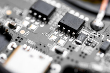 Fototapeta na wymiar Electronic circuit board close-up. Chips on the board