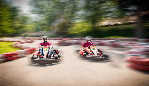 Go kart speed drive race sport contest with motion blur effect
