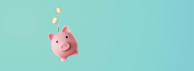 pink piggy bank with coins falling inside - savings concept - obrazy, fototapety, plakaty