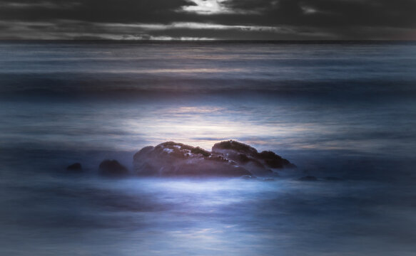 Moon set on Moonstone Beach, Cambria, California