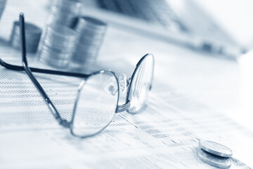 glasses and coins on the table