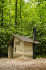 Rustic Outhouse Bathroom in the Forest 