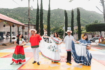Young people in traditional Nicaraguan costume performing a traditional Nicaraguan dance called polkas and mazurkas in Jinotega - obrazy, fototapety, plakaty
