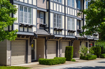 Architectural details of modern apartment building. New Modern Apartment Buildings with garages in Vancouver BC
