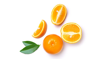 Orange fruit with cut sliced and green leaves isolated on white background, top view, flat lay.