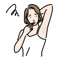 ワキの肌荒れに悩んでいる若い女性
