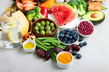 Healthy food assortment on light background.