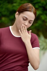 A Sleepy Youthful Asian Person