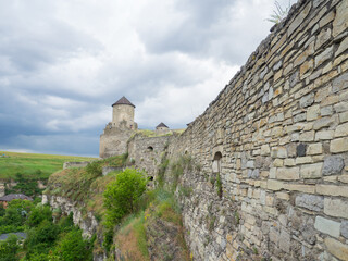 Kamianets Podilskyi fortress on cloudy day in Khmelnytskyi Region, Ukraine. Popes Tower, also known...