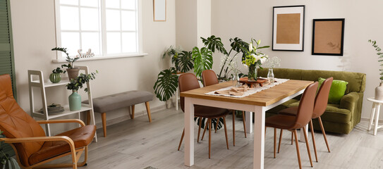 Interior of modern stylish dining room with houseplants