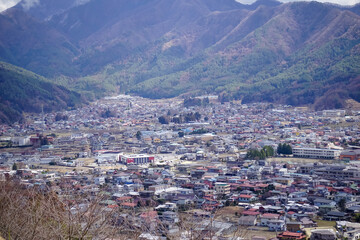 Naklejka premium Scenery of mountain and townscape in early in countryside, Tokyo, japan