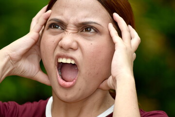 Stressful Youthful Asian Adult Wearing Tshirt