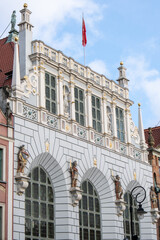 Artus court statue of Neptune fountain in City hall Ancient architecture of old town in Gdansk...