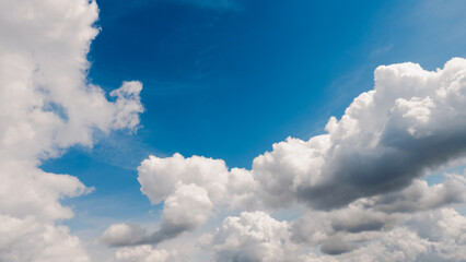Naklejka na ściany i meble White, Fluffy Clouds In Blue Sky. Background From Clouds.