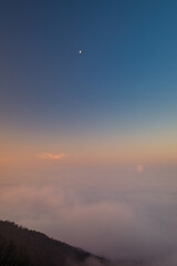 Scenic view of mountains against sky during sunrise