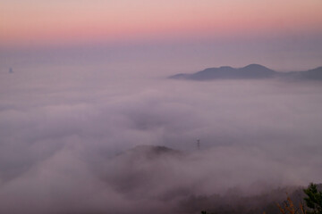 Scenic view of mountains against sky during sunrise