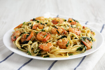 Homemade One-Pot Lemon Garlic Shrimp Pasta on a Plate, low angle view.