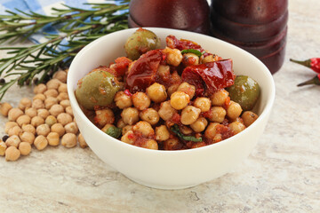 Chickpea beans with dry tomato and olives