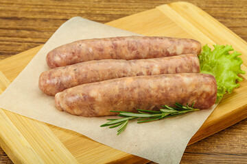 Raw pork meat sausages for grill