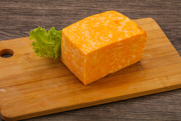 Marble cheese brick over board