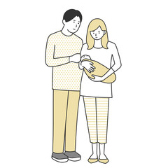 赤ちゃんをのぞきこむ若い家族