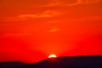 Scenic view of mountains against sky during sunrise