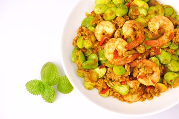 Stir-Fried Pork with Stink Beans and Shrimp Paste,Thai food isolated on white background 