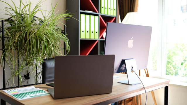 Tbilisi, Georgia - May 31, 2022: Modern tech office and ipad monitor New iMac Mi concept