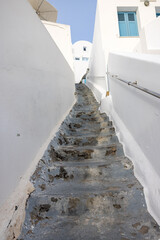 Narrow stone steps, a traditional piece of architecture on the island of Santorini. Greece