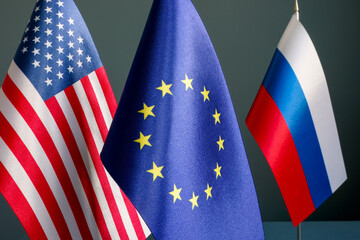 Flags of USA, EU and Russia. Sanctions concept.