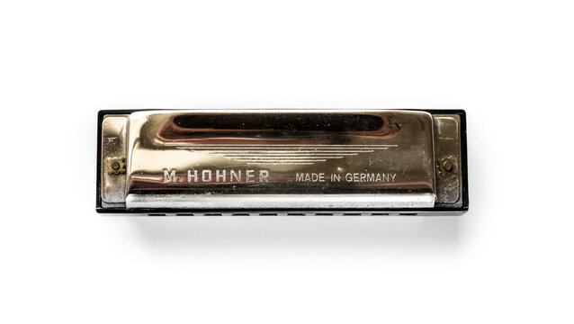 Vintage M. Hohner harmonica isolated on a white background, Paris, France