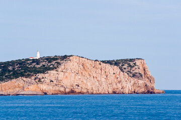 Fototapeta na wymiar Faro de la isla Conillera.Parque natural Cala Bassa-Cala Compte.Ibiza.Balearic islands.Spain.