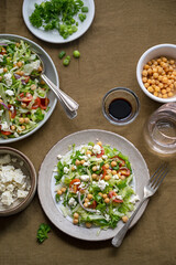 Healthy cabbage salad with tomatoes, parsley, onions, salad cheese, chickpeas. Detox, healthy food