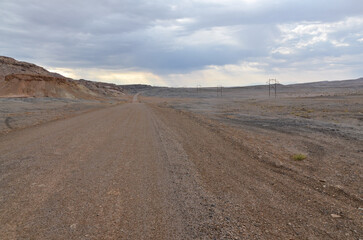 Crystal Geyser gravel road in the desert of southern Utah near Green River