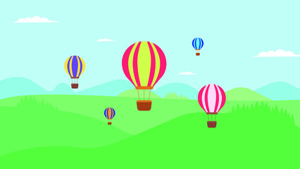 Obraz na płótnie Canvas five balloons fly over the field
