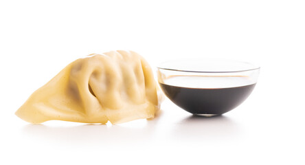Chinese dumplings and soy sauce isolated on white background.