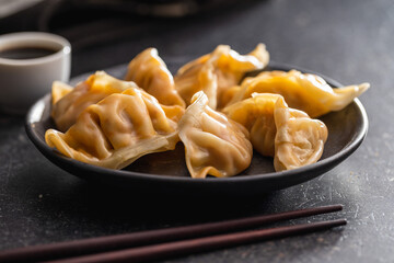 Chinese dumplings on plate.