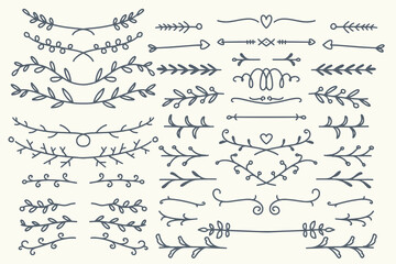 Thirty Hand drawn vector dividers. Lines, borders and laurels set. Doodle design elements isolated on white background. © ngupakarti