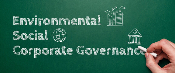 Concept esg or environmental social governance. Hand with chalk drawing text