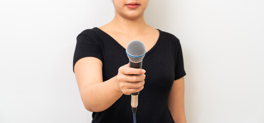 Asian women hand holding microphone