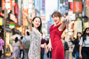 Two women posing in downtown