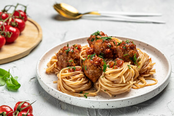 Meatballs served over italian spaghetti pasta with tomato sauce. Italian food. banner, menu, recipe place for text, top view