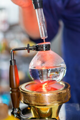 Making coffee with syphon method