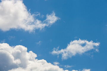 blue sky with cumulus clouds