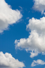 blue sky with cumulus clouds