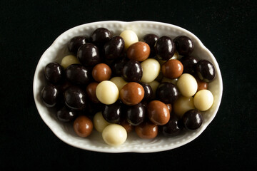Chocolate covered hazelnuts.  Chocolate balls
