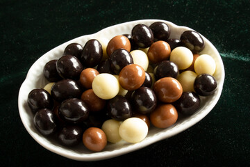 Chocolate covered hazelnuts.  Chocolate balls