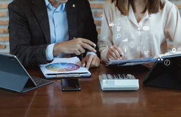 Fototapeta premium Business partners working on table office, business planning and technology development interface connection concept. 