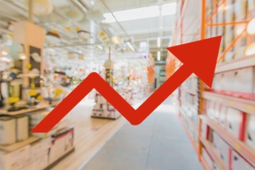 Red up arrow on blur image of supermarket background. Charts and graphs. Stock Market. Shop